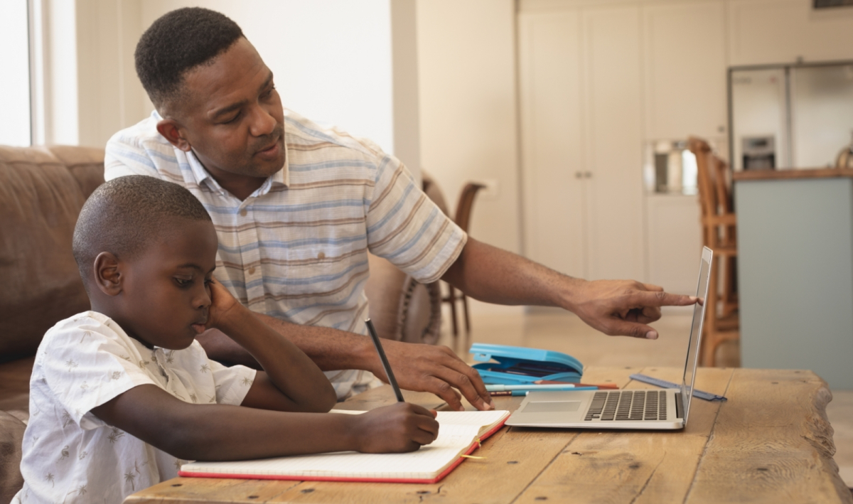 Father and son learning together